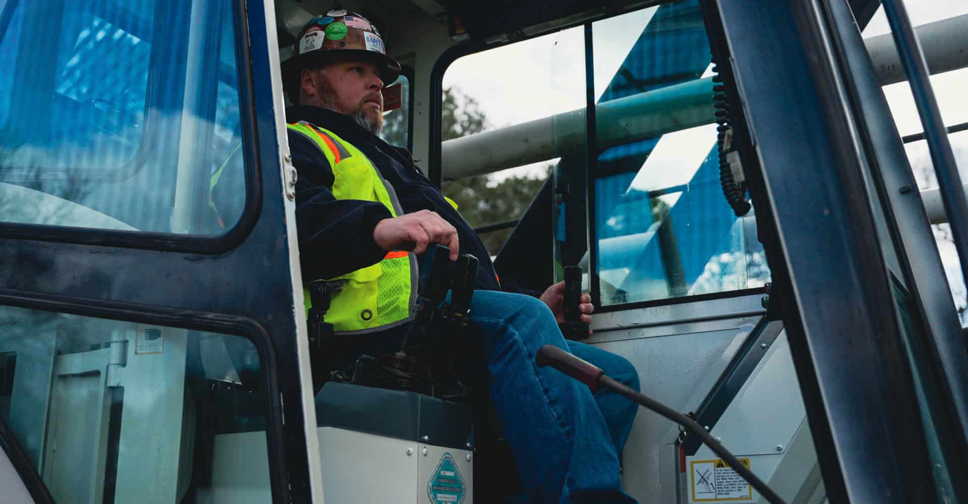 Complete overview of Starting a Crane Operator Career After 40 featuring certified crane operator executing lift plan with proper hand signals, ground crew coordination, and safety zone establishment per OSHA regulations