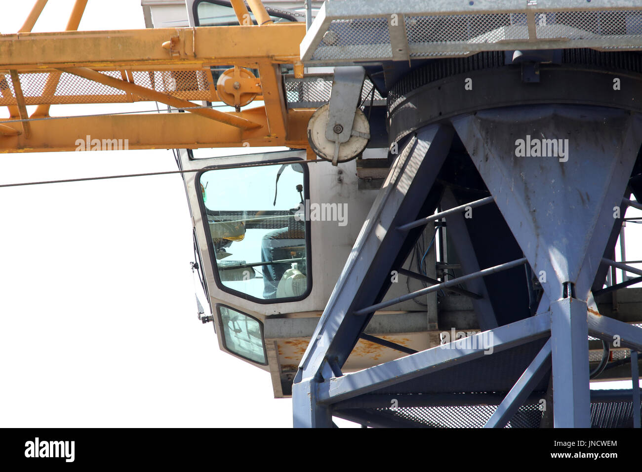 Crane operator performing crane cab controls procedures during pre-shift inspection - critical skills tested on NCCCO written and practical exams for LAT and TSS certification