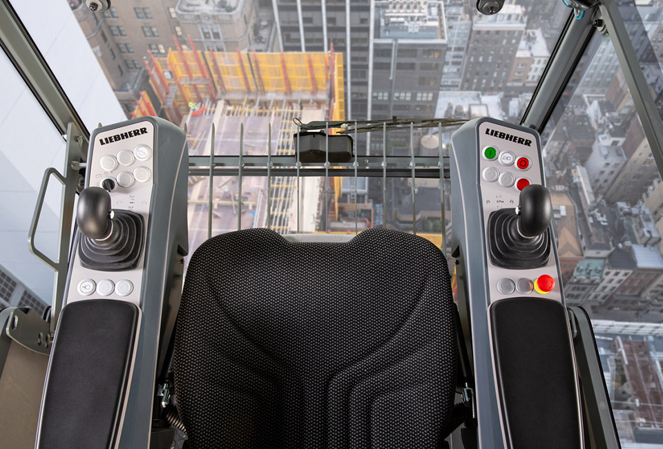 Detailed view of Crane Cab Controls Layout and Ergonomics implementation showing proper crane setup and rigging configuration as required by OSHA 29 CFR 1926 regulations and ASME B30.5 standards for certified operators