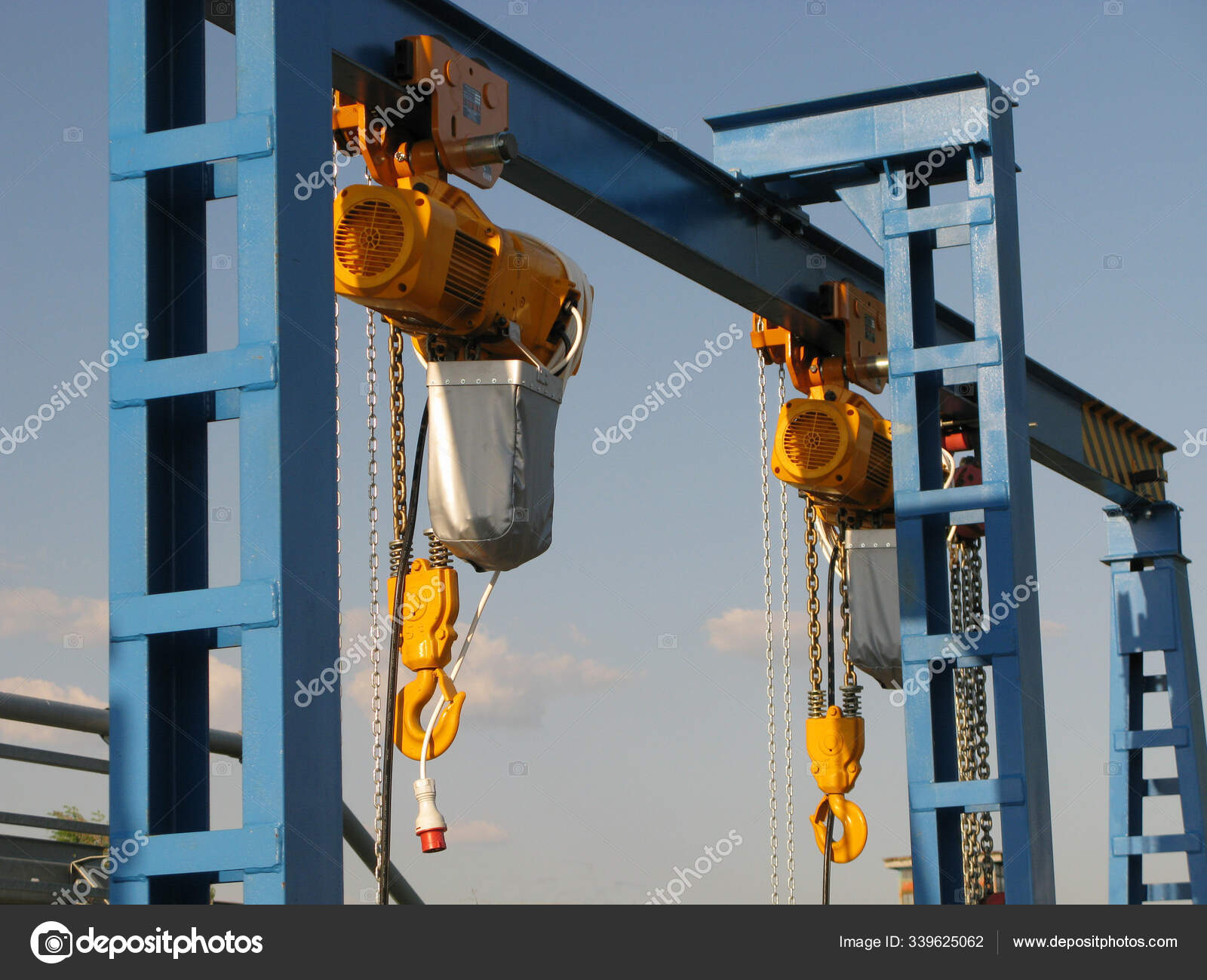 Complete overview of Crane Hook Types Sizes and Load Ratings featuring certified crane operator executing lift plan with proper hand signals, ground crew coordination, and safety zone establishment per OSHA regulations