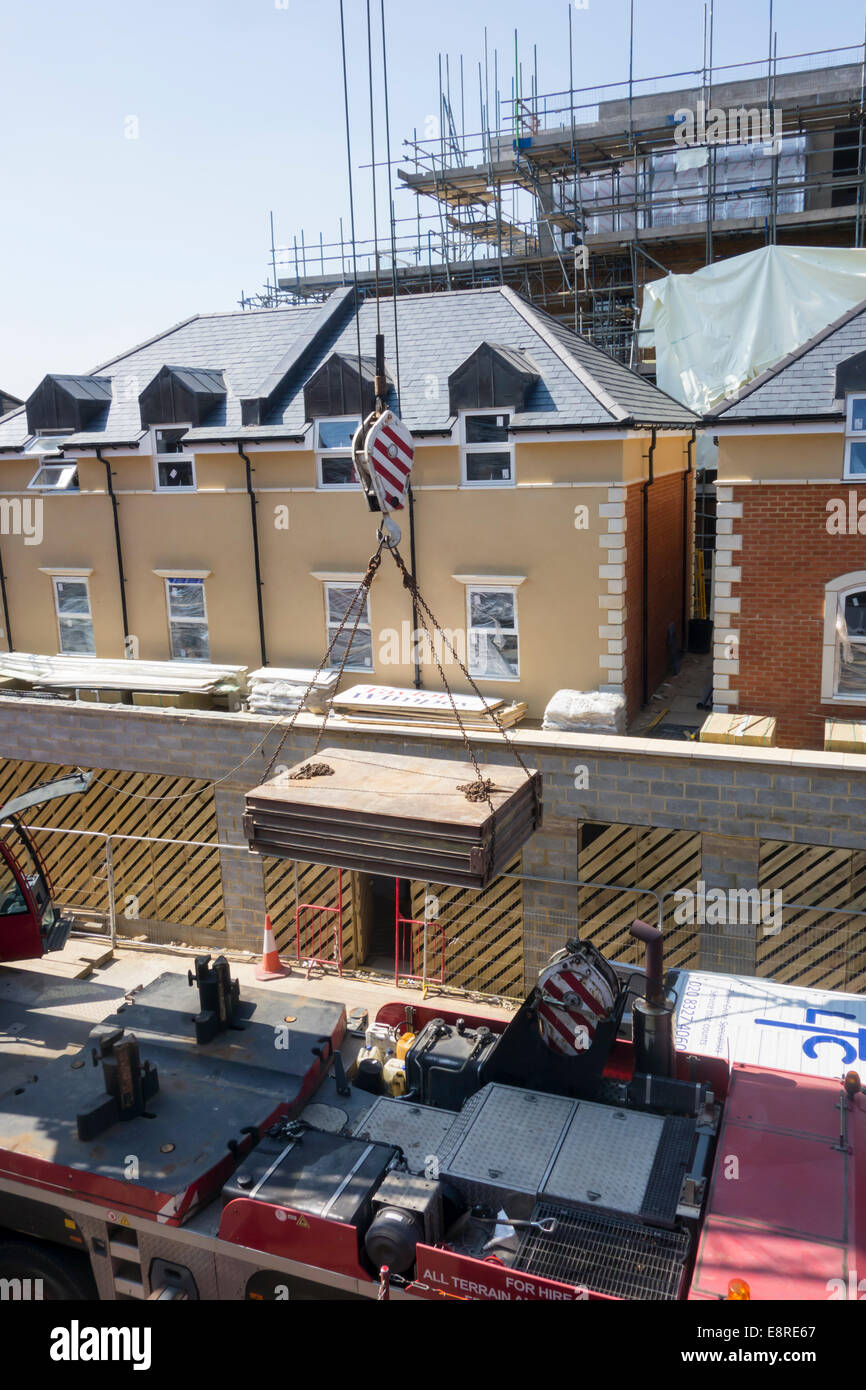 Step-by-step demonstration of Crane Hook Types Sizes and Load Ratings showing load chart interpretation, boom angle calculations, and outrigger positioning per NCCCO certification requirements and ASME standards