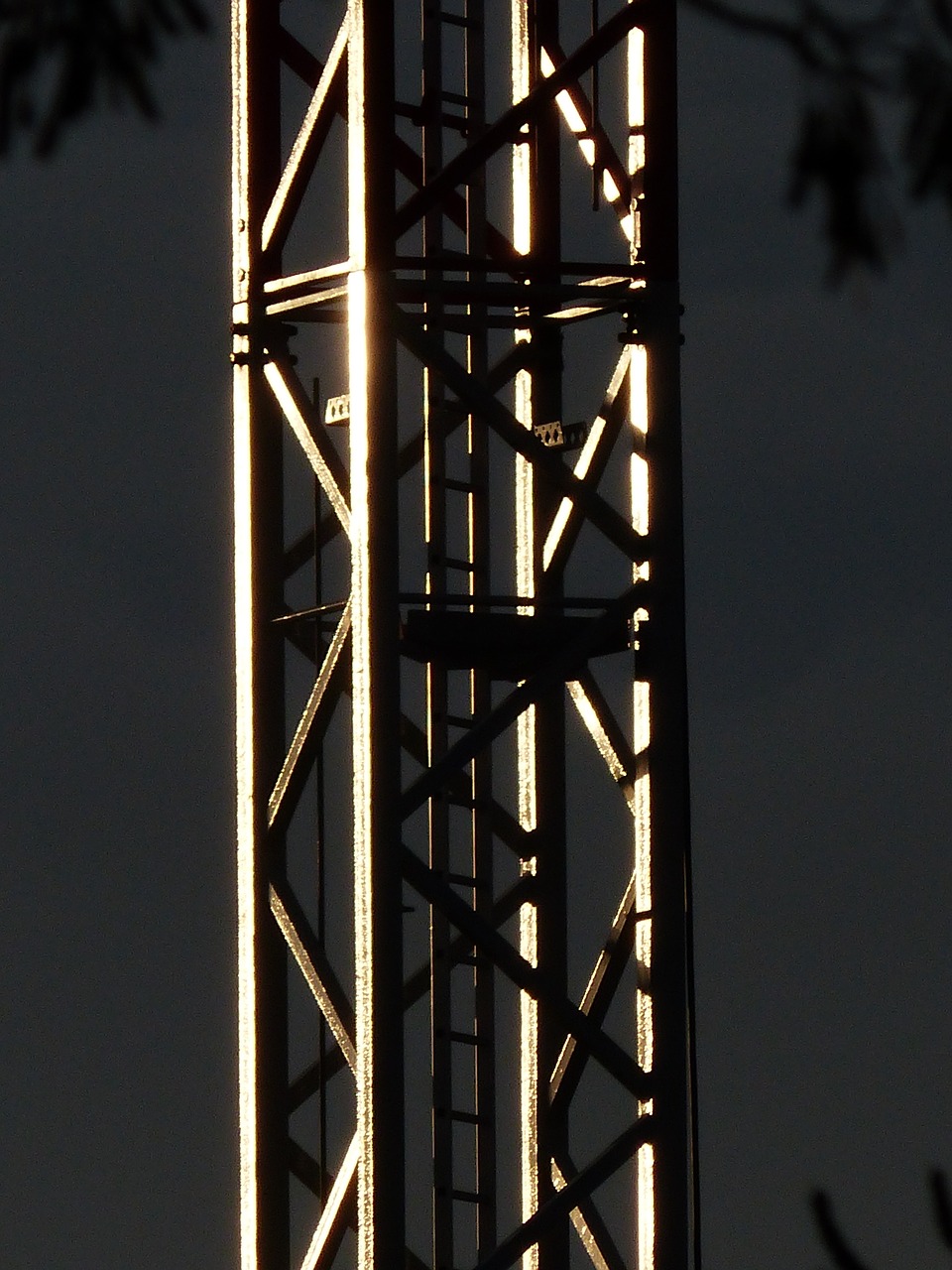 Complete overview of Telescopic Boom vs Lattice Boom Cranes featuring certified crane operator executing lift plan with proper hand signals, ground crew coordination, and safety zone establishment per OSHA regulations