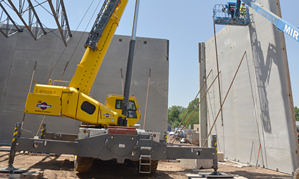 Crane operator performing grove crane procedures during pre-shift inspection - critical skills tested on NCCCO written and practical exams for LAT and TSS certification