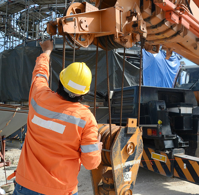 Step-by-step demonstration of Crane Boom Pin and Connection Inspection showing load chart interpretation, boom angle calculations, and outrigger positioning per NCCCO certification requirements and ASME standards
