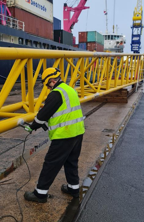 Detailed view of Crane Boom Pin and Connection Inspection implementation showing proper crane setup and rigging configuration as required by OSHA 29 CFR 1926 regulations and ASME B30.5 standards for certified operators