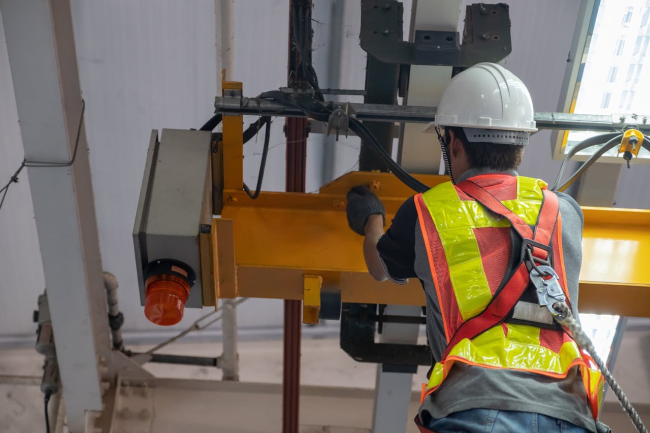 Professional crane operator demonstrating Crane Storage and Return to Service Inspection techniques on an active construction site - essential knowledge for NCCCO certification exam preparation covering crane storage inspection safety protocols and operational procedures