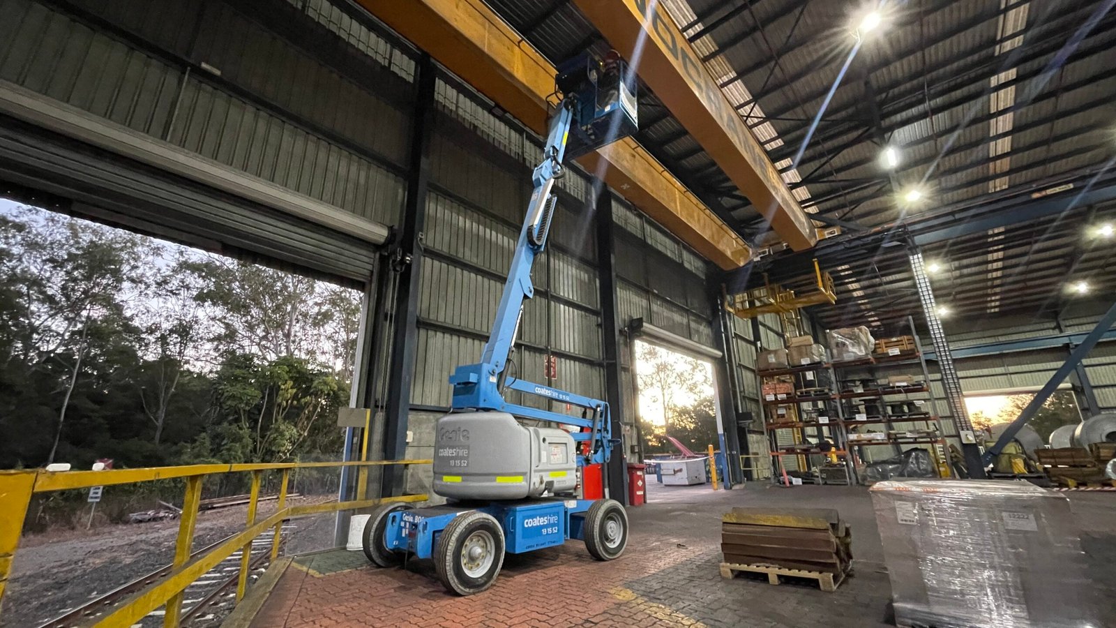 Complete overview of Crane Structural Crack Detection Methods featuring certified crane operator executing lift plan with proper hand signals, ground crew coordination, and safety zone establishment per OSHA regulations