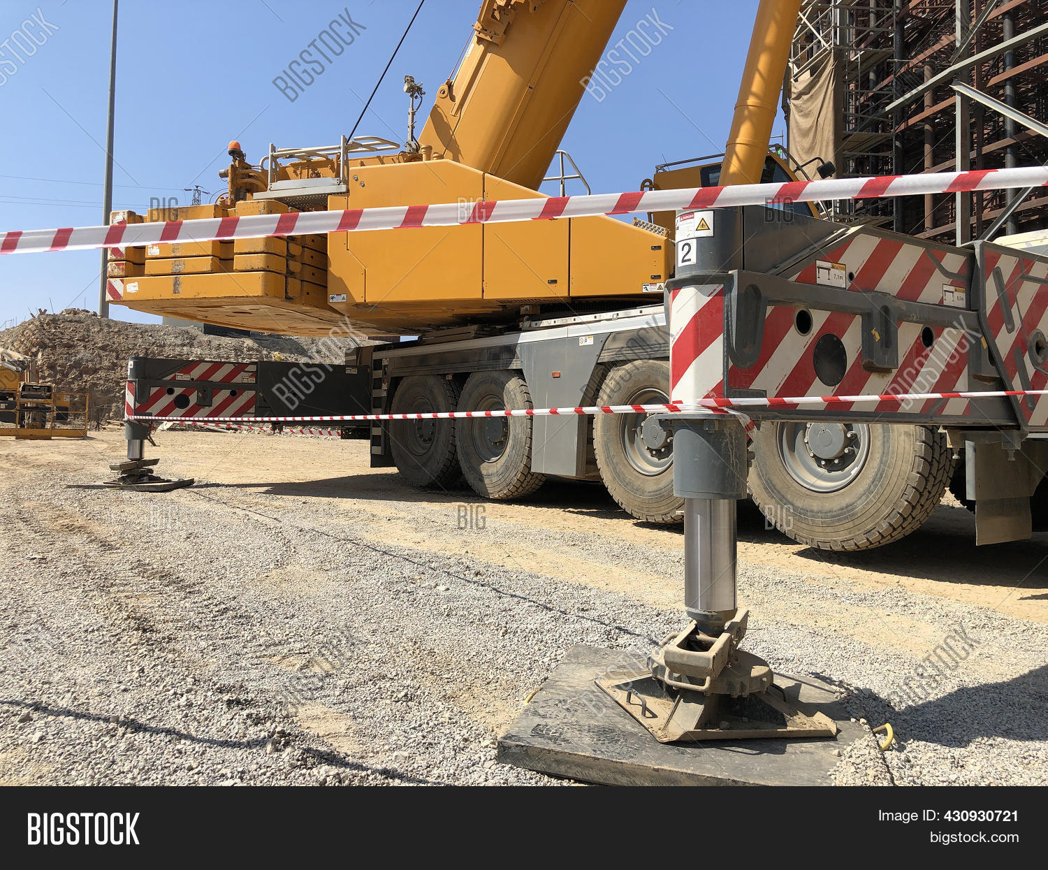Detailed view of Outrigger Beam and Cylinder Inspection implementation showing proper crane setup and rigging configuration as required by OSHA 29 CFR 1926 regulations and ASME B30.5 standards for certified operators