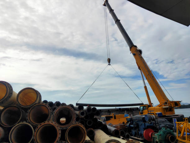 Professional crane operator demonstrating Wire Rope Retirement Criteria Complete Guide techniques on an active construction site - essential knowledge for NCCCO certification exam preparation covering wire rope retirement safety protocols and operational procedures
