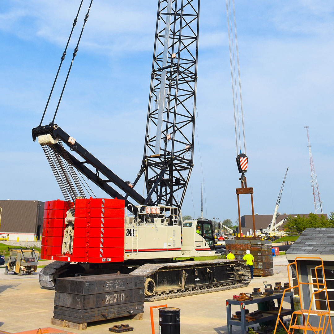 Crane operator performing link belt crane procedures during pre-shift inspection - critical skills tested on NCCCO written and practical exams for LAT and TSS certification