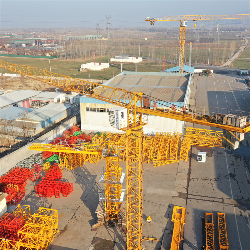 Professional crane operator demonstrating How Boom Length Affects Crane Capacity techniques on an active construction site - essential knowledge for NCCCO certification exam preparation covering boom length capacity safety protocols and operational procedures