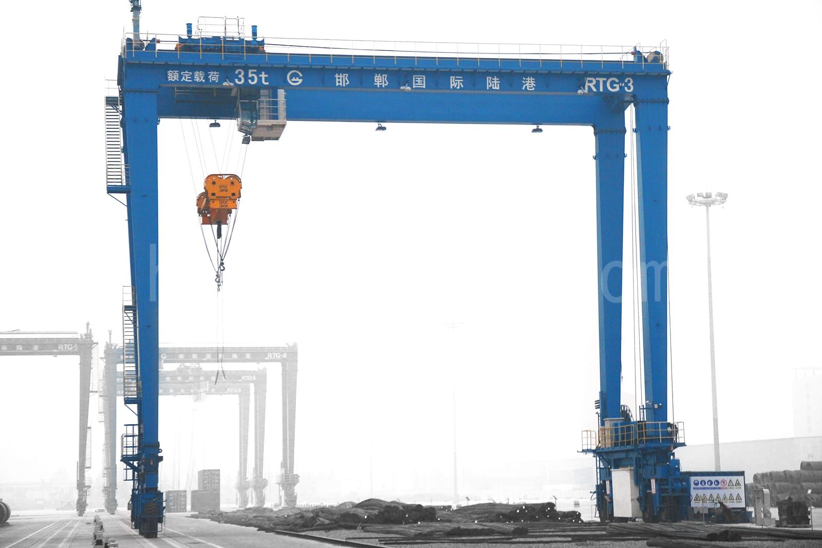 Complete overview of Over Side vs Over Rear Crane Capacity featuring certified crane operator executing lift plan with proper hand signals, ground crew coordination, and safety zone establishment per OSHA regulations