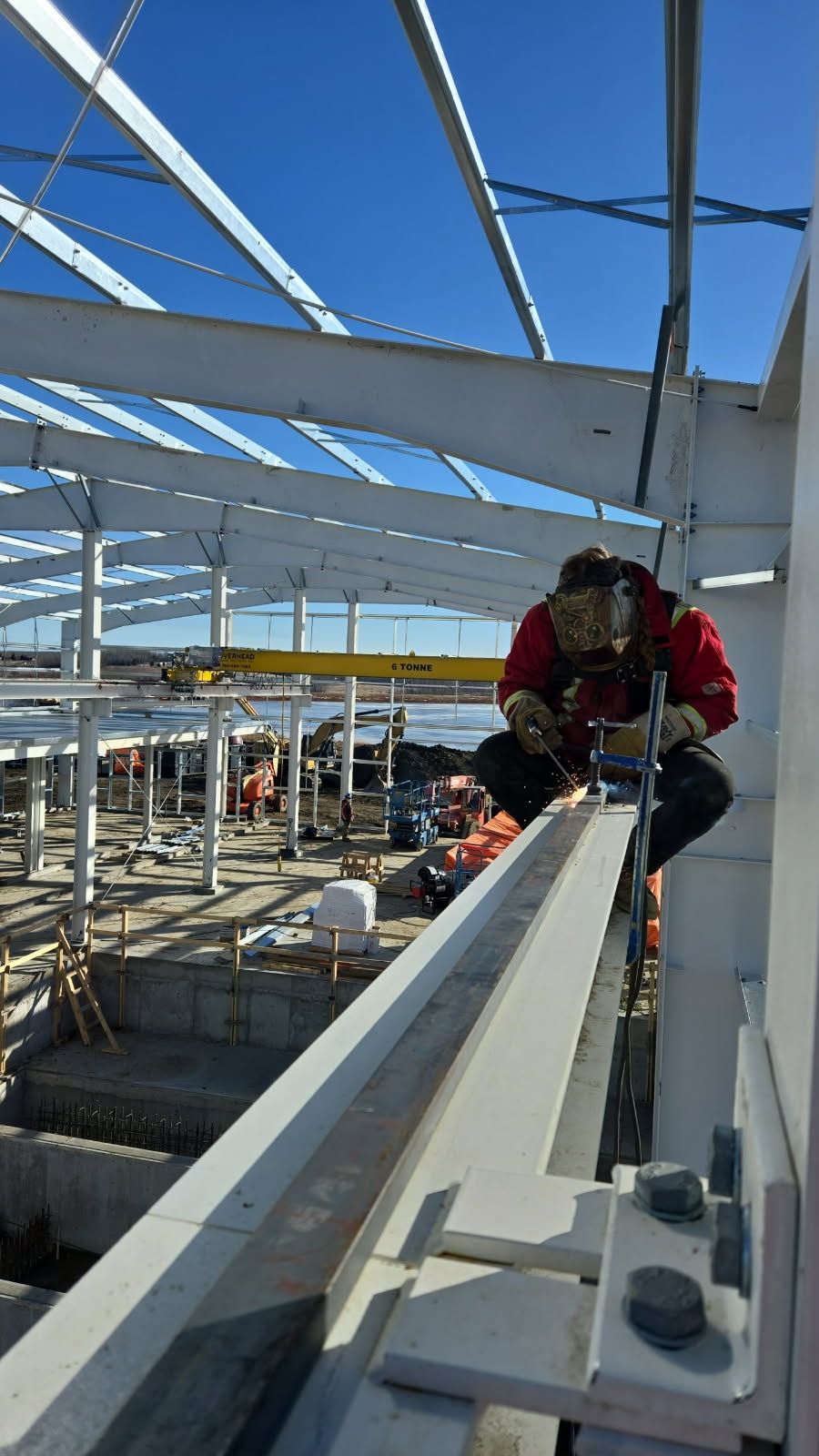 Professional crane operator demonstrating Over Side vs Over Rear Crane Capacity techniques on an active construction site - essential knowledge for NCCCO certification exam preparation covering over side capacity safety protocols and operational procedures