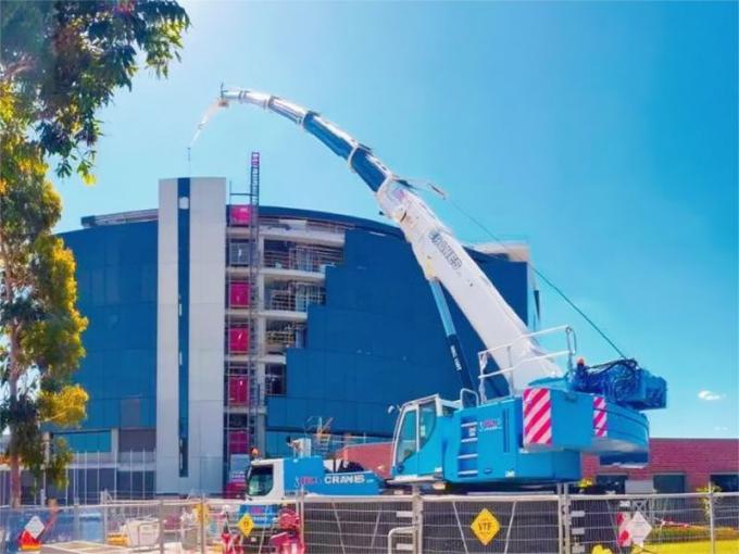 Step-by-step demonstration of Understanding Crane Boom Deflection showing load chart interpretation, boom angle calculations, and outrigger positioning per NCCCO certification requirements and ASME standards
