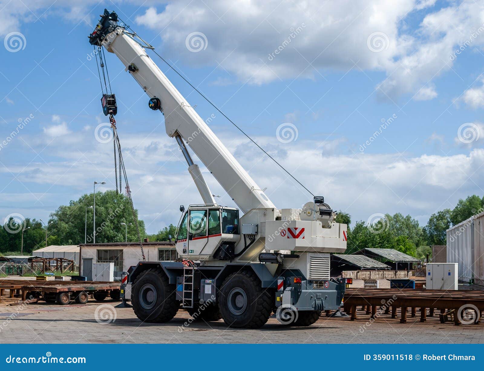 Complete overview of Mobile Crane Load Chart Basics featuring certified crane operator executing lift plan with proper hand signals, ground crew coordination, and safety zone establishment per OSHA regulations