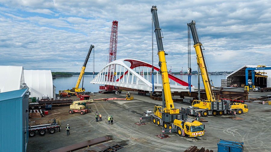 Detailed view of Multi-Crane Lift Procedures implementation showing proper crane setup and rigging configuration as required by OSHA 29 CFR 1926 regulations and ASME B30.5 standards for certified operators