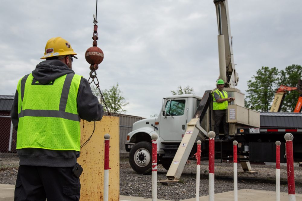Detailed view of NCCCO Rigger Level 1 Certification Guide implementation showing proper crane setup and rigging configuration as required by OSHA 29 CFR 1926 regulations and ASME B30.5 standards for certified operators