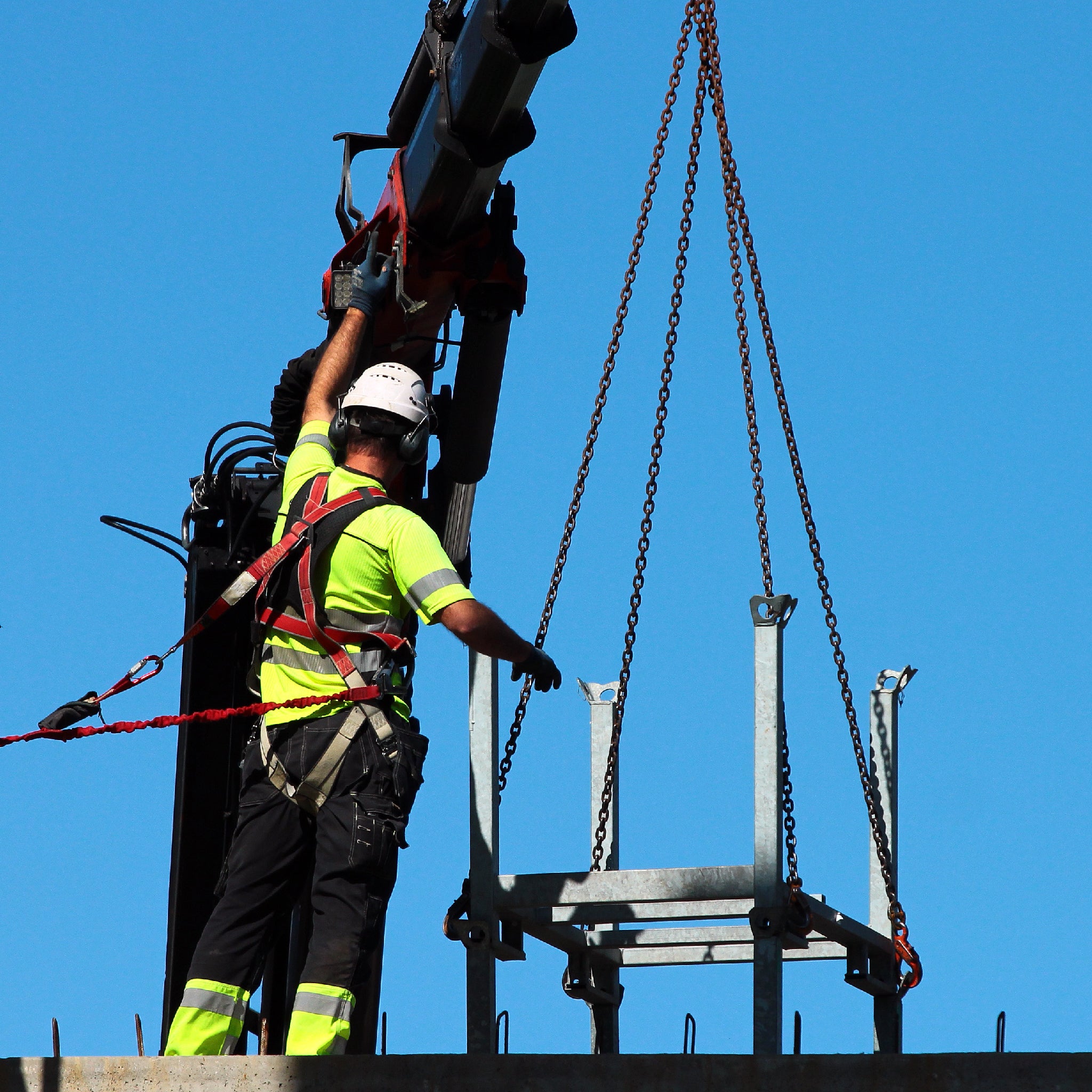 Complete overview of NCCCO Rigger Level 2 Certification Guide featuring certified crane operator executing lift plan with proper hand signals, ground crew coordination, and safety zone establishment per OSHA regulations