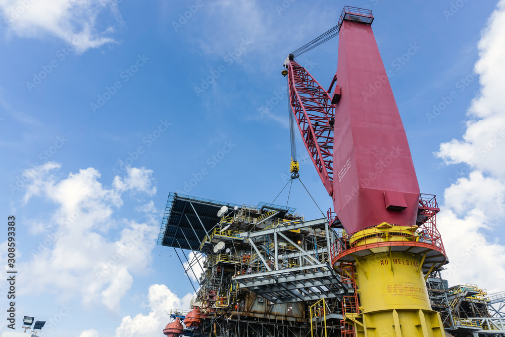 Step-by-step demonstration of Offshore Crane Operator Jobs showing load chart interpretation, boom angle calculations, and outrigger positioning per NCCCO certification requirements and ASME standards