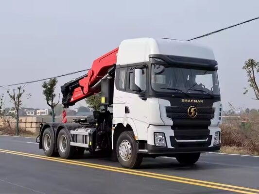 Professional crane operator demonstrating OSHA Crane Electrical Grounding Requirements techniques on an active construction site - essential knowledge for NCCCO certification exam preparation covering crane grounding osha safety protocols and operational procedures