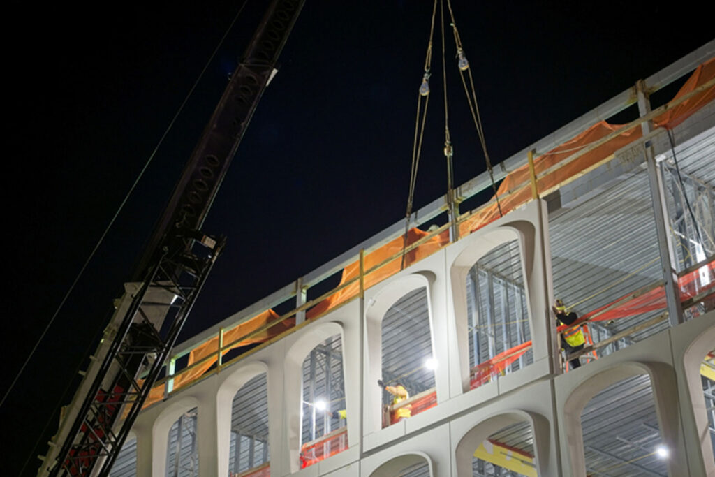 Step-by-step demonstration of OSHA Crane Emergency Response Procedures showing load chart interpretation, boom angle calculations, and outrigger positioning per NCCCO certification requirements and ASME standards