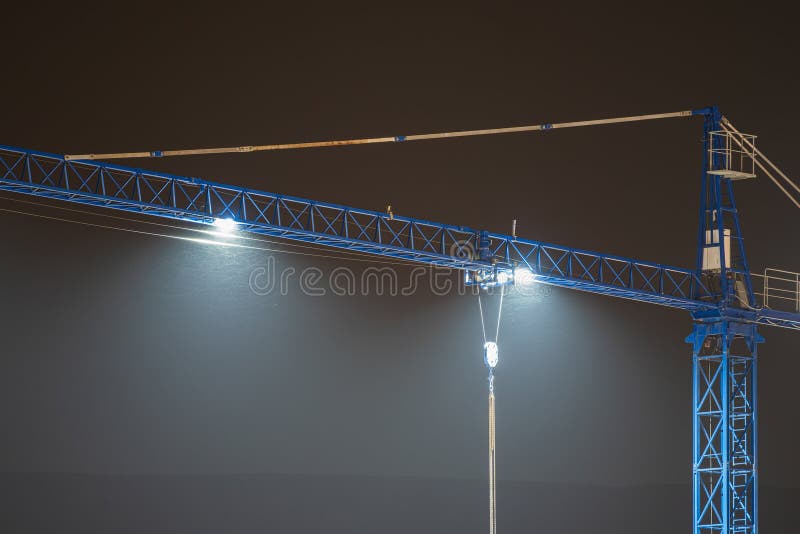Crane operator performing osha crane lighting procedures during pre-shift inspection - critical skills tested on NCCCO written and practical exams for LAT and TSS certification