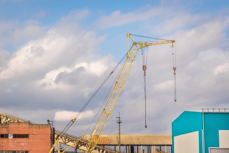Professional crane operator demonstrating OSHA Crane Work Zone Control Requirements techniques on an active construction site - essential knowledge for NCCCO certification exam preparation covering crane work zone safety protocols and operational procedures