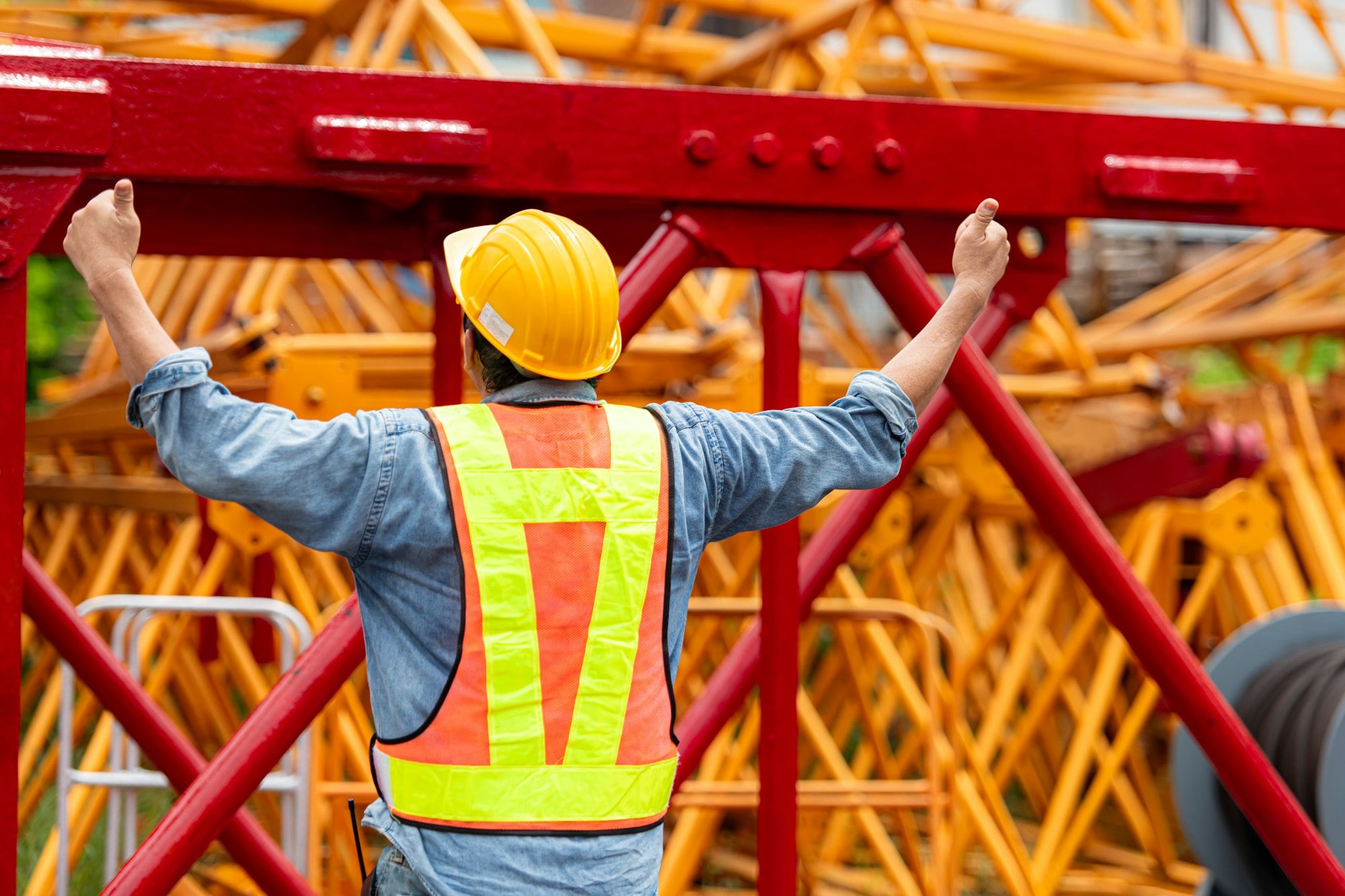 Detailed view of OSHA Multi-Employer Worksite Crane Rules implementation showing proper crane setup and rigging configuration as required by OSHA 29 CFR 1926 regulations and ASME B30.5 standards for certified operators
