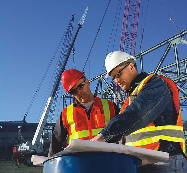Professional crane operator demonstrating Pre-Lift Safety Meeting Checklist techniques on an active construction site - essential knowledge for NCCCO certification exam preparation covering pre lift meeting safety protocols and operational procedures