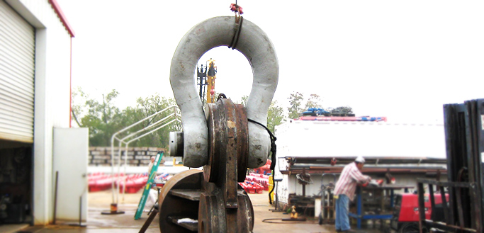 Crane operator performing shackle selection procedures during pre-shift inspection - critical skills tested on NCCCO written and practical exams for LAT and TSS certification