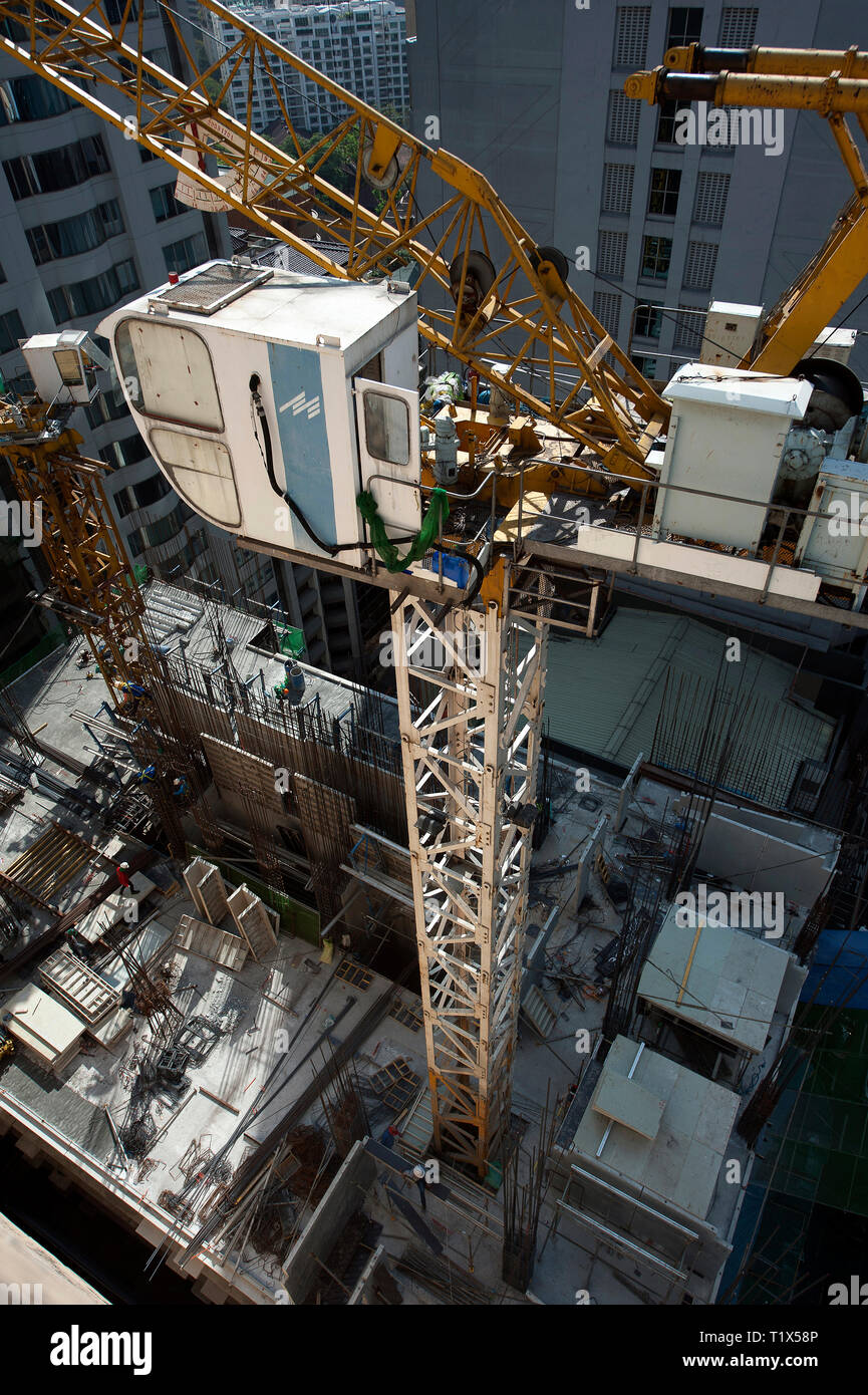 Step-by-step demonstration of Crane Operations Supporting Confined Space Work showing load chart interpretation, boom angle calculations, and outrigger positioning per NCCCO certification requirements and ASME standards