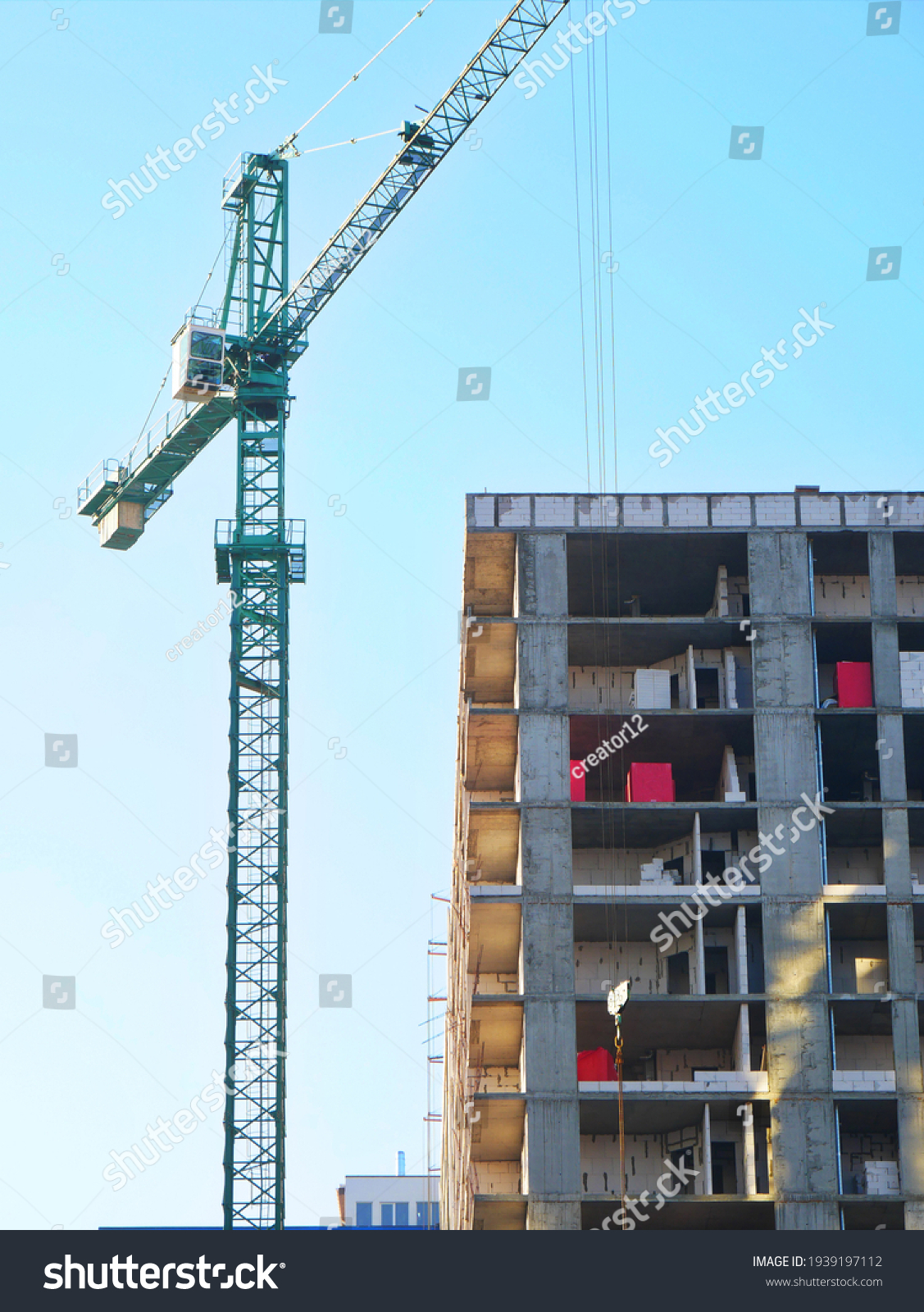 Step-by-step demonstration of Crane Operations Near Existing Structures showing load chart interpretation, boom angle calculations, and outrigger positioning per NCCCO certification requirements and ASME standards
