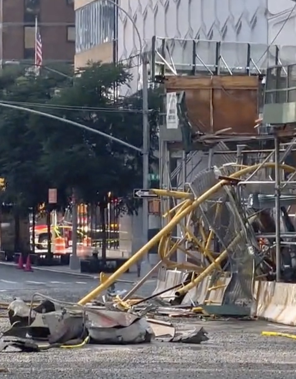 Professional crane operator demonstrating Struck By Hazard Prevention in Crane Operations techniques on an active construction site - essential knowledge for NCCCO certification exam preparation covering struck by crane safety protocols and operational procedures