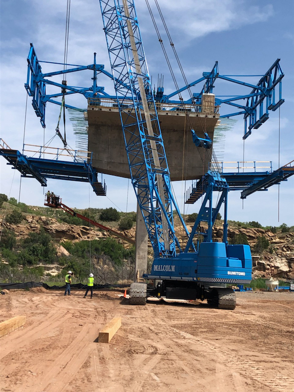 Crane operator performing heat illness crane operator procedures during pre-shift inspection - critical skills tested on NCCCO written and practical exams for LAT and TSS certification