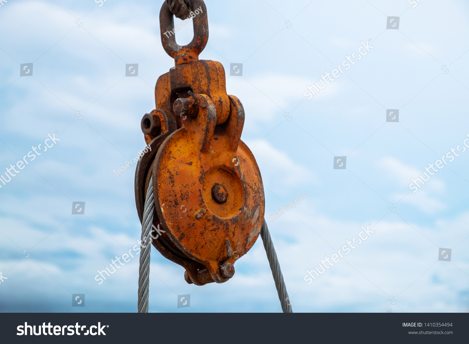 Professional crane operator demonstrating Synthetic Sling Inspection Guide techniques on an active construction site - essential knowledge for NCCCO certification exam preparation covering synthetic sling safety protocols and operational procedures