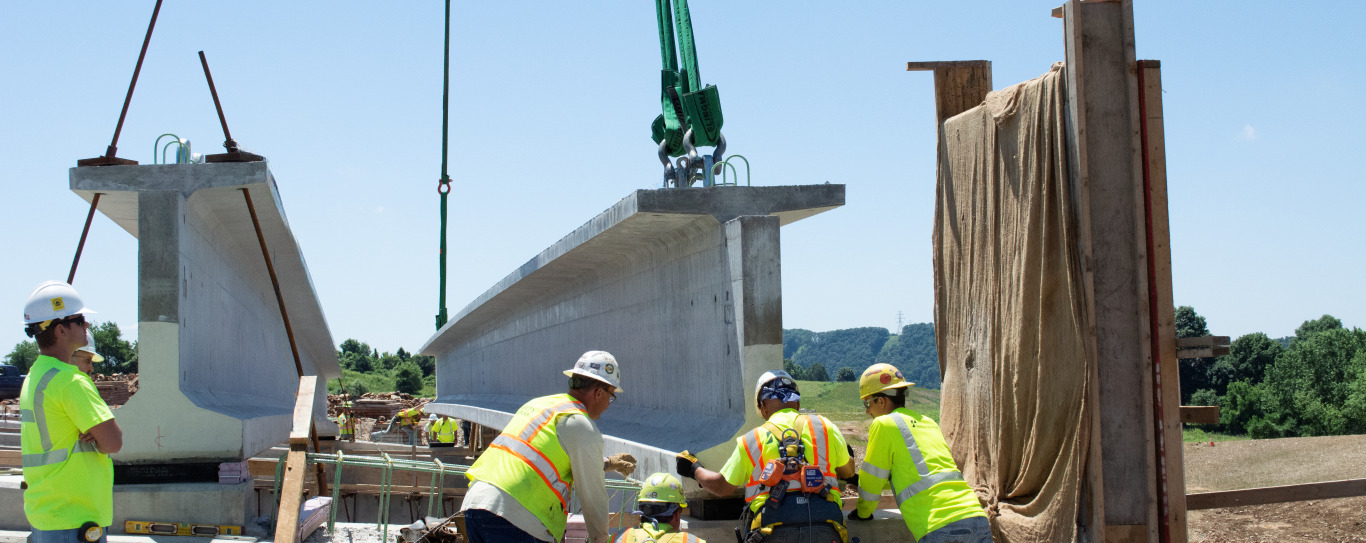 Detailed view of Synthetic Sling Inspection Guide implementation showing proper crane setup and rigging configuration as required by OSHA 29 CFR 1926 regulations and ASME B30.5 standards for certified operators