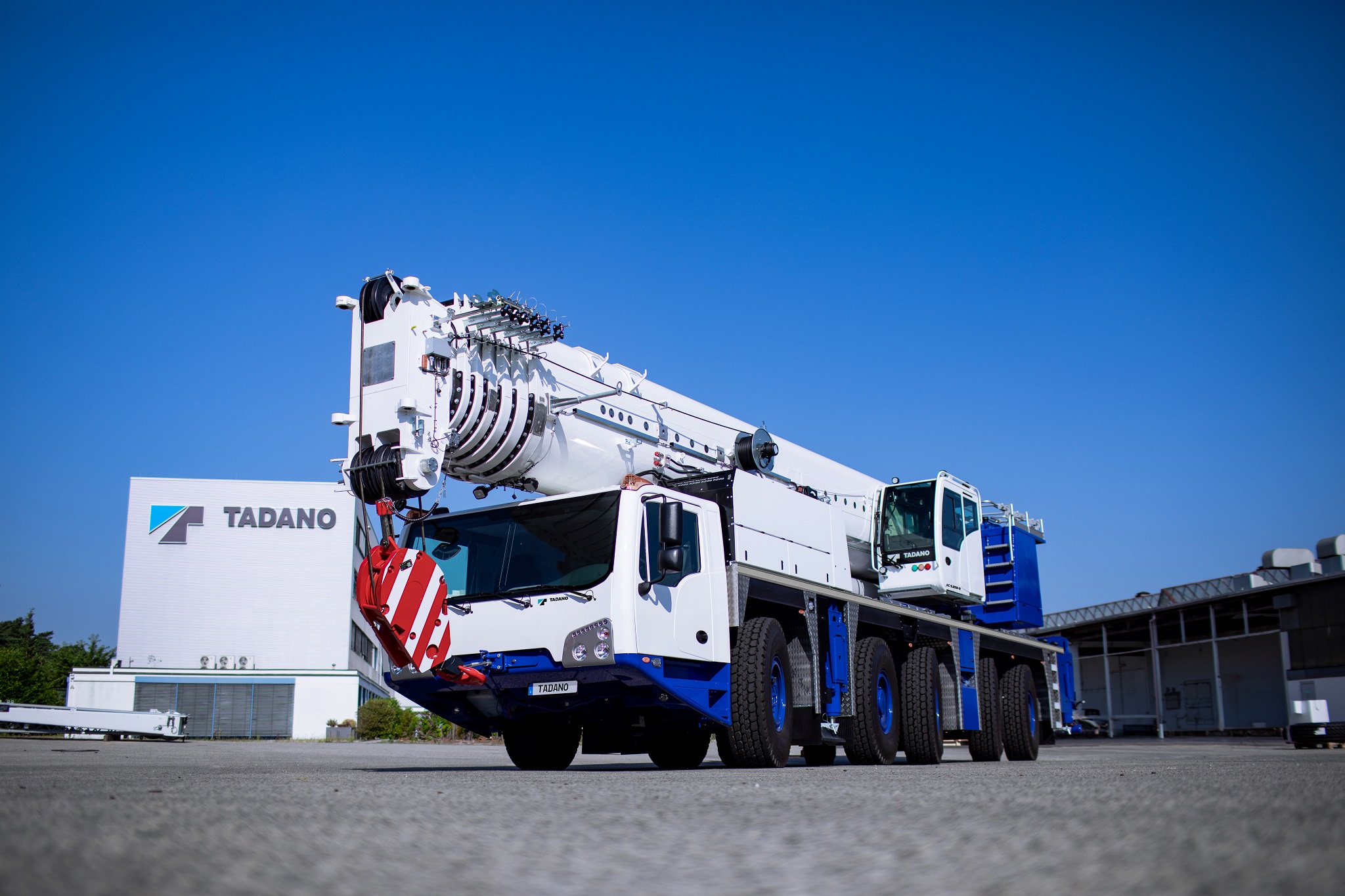 Crane operator performing tadano crane procedures during pre-shift inspection - critical skills tested on NCCCO written and practical exams for LAT and TSS certification