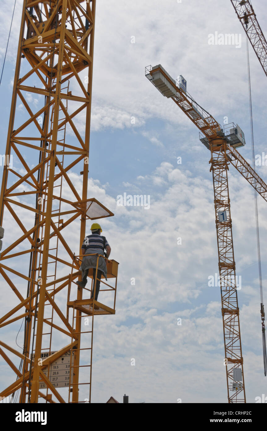 Crane operator performing tower crane operator procedures during pre-shift inspection - critical skills tested on NCCCO written and practical exams for LAT and TSS certification
